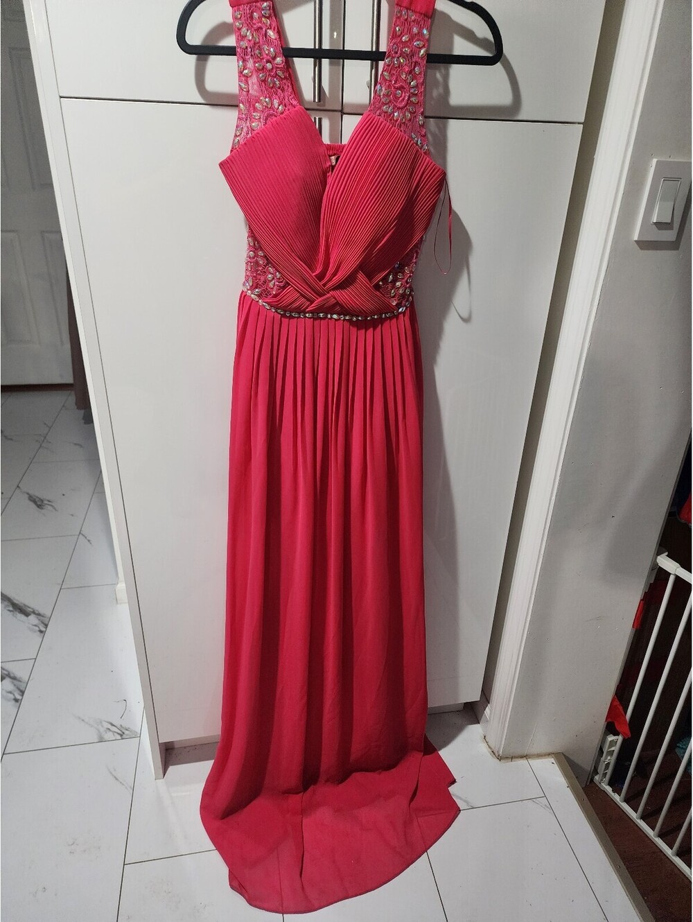 Elegant Pink Sleeveless Evening Gown with Embellished Bodice Flowing Skirt lg